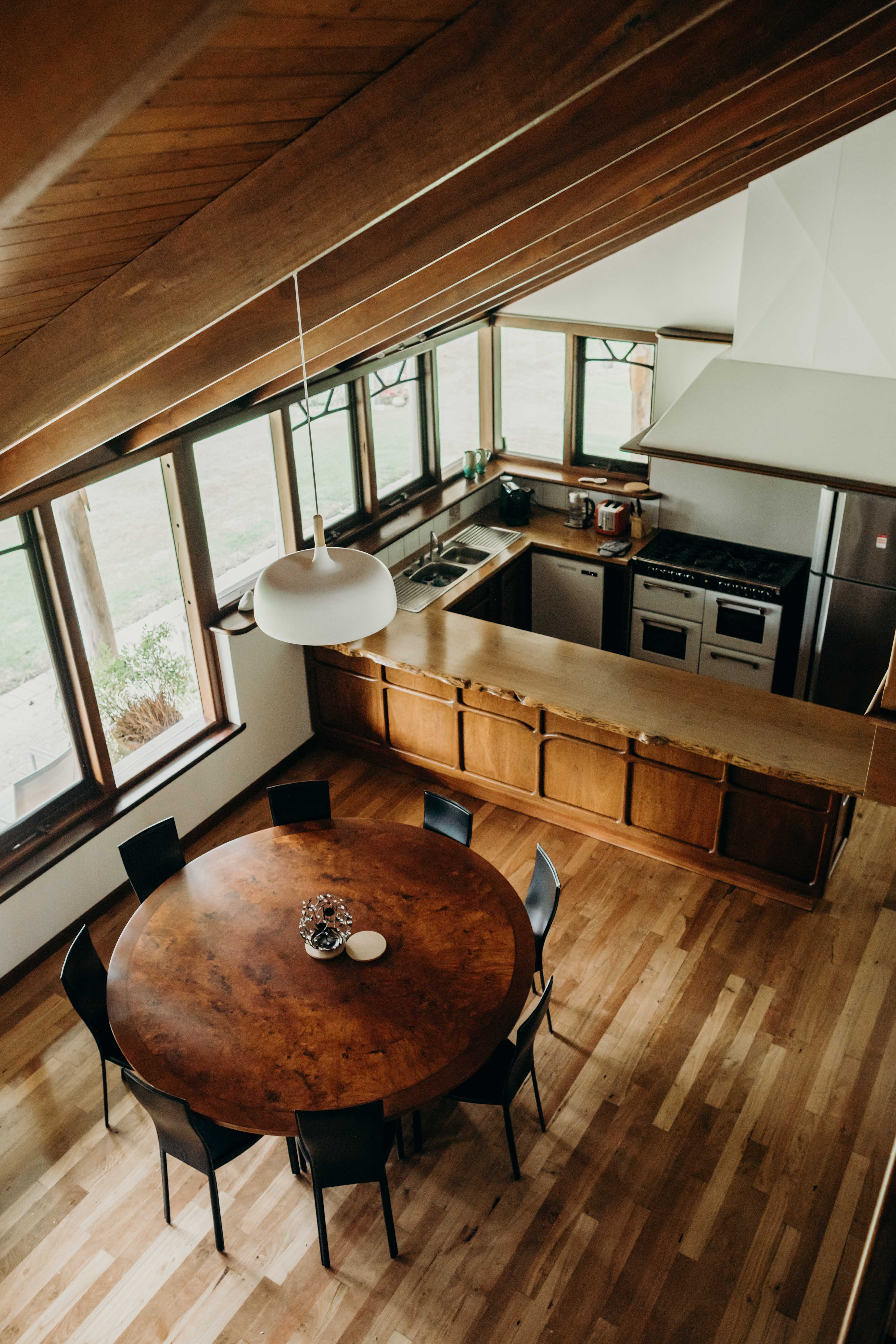 The round jarrah dining table in a southwest home